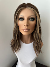 Load image into Gallery viewer, Melanie is a 17" length, small hand tied stretch cap made with premium Brazilian quality human hair