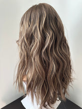 Load image into Gallery viewer, Bridget is a 19” layered length with face frame, small cap made with premium Euro quality human hair