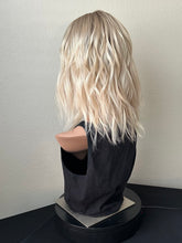 Load image into Gallery viewer, Sky is a 14” layered length, 10X11 whopper style topper made with premium Brazilian quality human hair