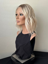 Load image into Gallery viewer, Sky is a 14” layered length, 10X11 whopper style topper made with premium Brazilian quality human hair