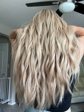 Load image into Gallery viewer, Lucy is a 25” layered length, small cap made with premium Brazilian quality human hair