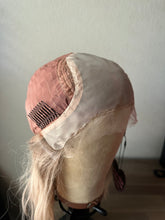Load image into Gallery viewer, Avery is a 15” length with curtain bangs, medium cap made with premium Brazilian quality human hair