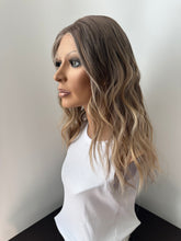 Load image into Gallery viewer, Liv is a 19” layered length with face frame, small cap made with premium Euro quality human hair