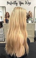 Load image into Gallery viewer, Honey is a 24” length, medium cap made with premium human Brazilian quality human hair
