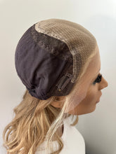 Load image into Gallery viewer, Savannah is a 17" length, medium hand tied stretch cap made with premium Brazilian quality human hair