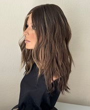 Load image into Gallery viewer, Layla is a 20” length with heavy layers, medium cap made with premium Brazilian quality human hair