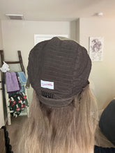Load image into Gallery viewer, Arlie is an 18” layered length, medium cap made with premium Brazilian quality human hair