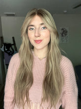 Load image into Gallery viewer, Gianna is a 25” layered length, medium cap made with premium Brazilian quality human hair