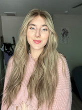 Load image into Gallery viewer, Gianna is a 25” layered length, medium cap made with premium Brazilian quality human hair