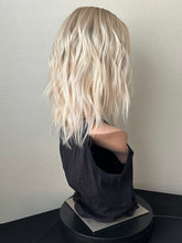 Load image into Gallery viewer, Sky is a 14” layered length, 10X11 whopper style topper made with premium Brazilian quality human hair