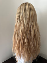 Load image into Gallery viewer, Lucy is a 25” layered length, small cap made with premium Brazilian quality human hair