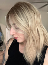 Load image into Gallery viewer, Avery is a 15” length with curtain bangs, medium cap made with premium Brazilian quality human hair
