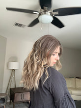 Load image into Gallery viewer, Liv is a 19” layered length with face frame, small cap made with premium Euro quality human hair