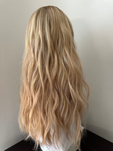 Load image into Gallery viewer, Lucy is a 25” layered length, small cap made with premium Brazilian quality human hair