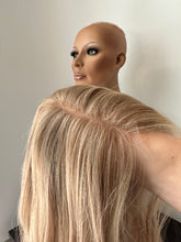 Load image into Gallery viewer, Lucy is a 25” layered length, small cap made with premium Brazilian quality human hair