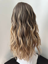 Load image into Gallery viewer, Liv is a 19” layered length with face frame, small cap made with premium Euro quality human hair