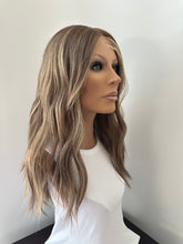 Load image into Gallery viewer, Bridget is a 22" long layered length with face frame, medium cap made with premium Euro quality human hair