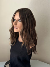 Load image into Gallery viewer, Layla is a 20” length with heavy layers, medium cap made with premium Brazilian quality human hair