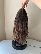 Load image into Gallery viewer, Layla is a 20” length with heavy layers, medium cap made with premium Brazilian quality human hair