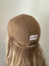 Load image into Gallery viewer, Preorder: Clarice is a 22” layered length, 10X11 whopper style topper made with premium Brazilian quality human hair