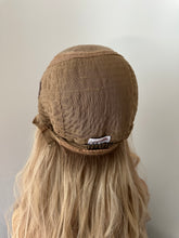 Load image into Gallery viewer, Lucy is a 25” layered length, small cap made with premium Brazilian quality human hair