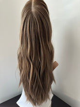 Load image into Gallery viewer, Bridget is a 22" long layered length with face frame, medium cap made with premium Euro quality human hair