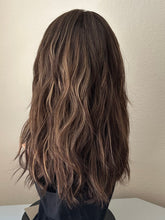 Load image into Gallery viewer, Layla is a 20” length with heavy layers, medium cap made with premium Brazilian quality human hair