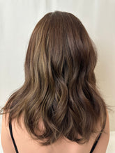 Load image into Gallery viewer, Marceline is a 17" length, medium cap made with premium Brazilian quality human hair