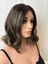 Load image into Gallery viewer, Caroline is a 14" layered length, small cap made with premium Brazilian quality human hair