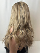 Load image into Gallery viewer, Savanna is a 22" layered length, medium cap made with premium Brazilian quality human hair