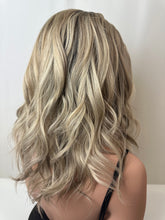 Load image into Gallery viewer, Evie is a 17" layered length, medium cap made with a premium Brazilian quality human hair