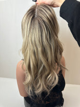 Load image into Gallery viewer, Evie is a 17" layered length, medium cap made with a premium Brazilian quality human hair