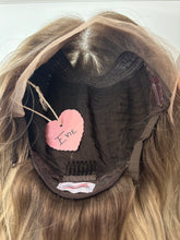 Load image into Gallery viewer, Evie is a 17" layered length, medium cap made with a premium Brazilian quality human hair