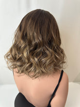 Load image into Gallery viewer, Jaxie is a 16" layered length, medium cap made with premium Brazilian quality human hair