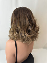 Load image into Gallery viewer, Jaxie is a 16" layered length, medium cap made with premium Brazilian quality human hair