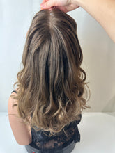 Load image into Gallery viewer, Jaxie is a 16" layered length, medium cap made with premium Brazilian quality human hair
