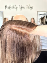 Load image into Gallery viewer, Brittany is an 18" layered length, small cap made with premium Brazilian texture hair