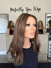 Load image into Gallery viewer, Brittany is an 18" layered length, medium cap made with premium Brazilian texture hair