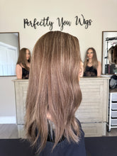 Load image into Gallery viewer, Brittany is an 18" layered length, medium cap made with premium Brazilian texture hair