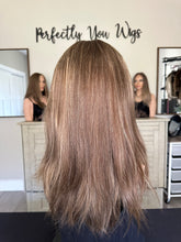 Load image into Gallery viewer, Brittany is an 18" layered length, medium cap made with premium Brazilian texture hair