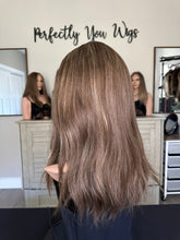 Load image into Gallery viewer, Brittany is an 18" layered length, medium cap made with premium Brazilian texture hair