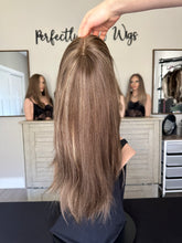 Load image into Gallery viewer, Brittany is an 18" layered length, medium cap made with premium Brazilian texture hair