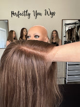 Load image into Gallery viewer, Brittany is an 18" layered length, medium cap made with premium Brazilian texture hair