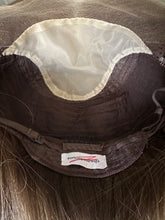 Load image into Gallery viewer, Brittany is an 18" layered length, medium cap made with premium Brazilian texture hair