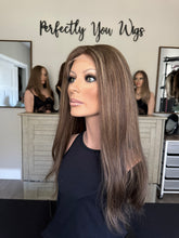 Load image into Gallery viewer, Monica is a 22" layered length, medium cap made with premium Brazilian texture hair