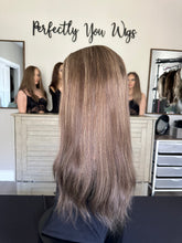 Load image into Gallery viewer, Monica is a 22" layered length, medium cap made with premium Brazilian texture hair