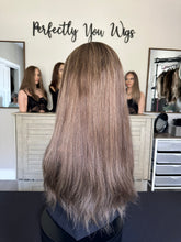 Load image into Gallery viewer, Monica is a 22" layered length, medium cap made with premium Brazilian texture hair