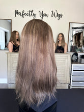 Load image into Gallery viewer, Monica is a 22" layered length, medium cap made with premium Brazilian texture hair