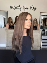 Load image into Gallery viewer, Monica is a 22" layered length, medium cap made with premium Brazilian texture hair