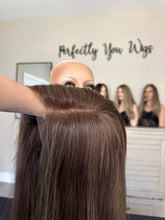 Load image into Gallery viewer, Monica is a 22" layered length, medium cap made with premium Brazilian texture hair